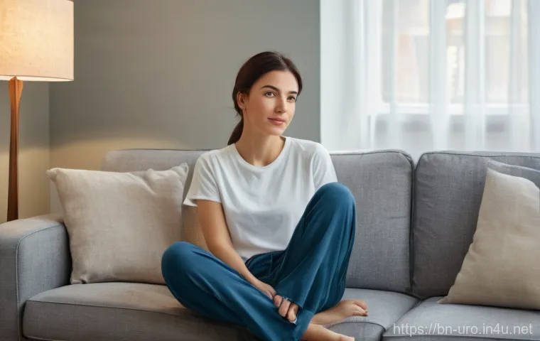 비뇨기 질환으로 인한 피로감 대처법 - A young woman in her late 20s or early 30s, dressed in comfortable, modest lounge wear (like a t-shi...